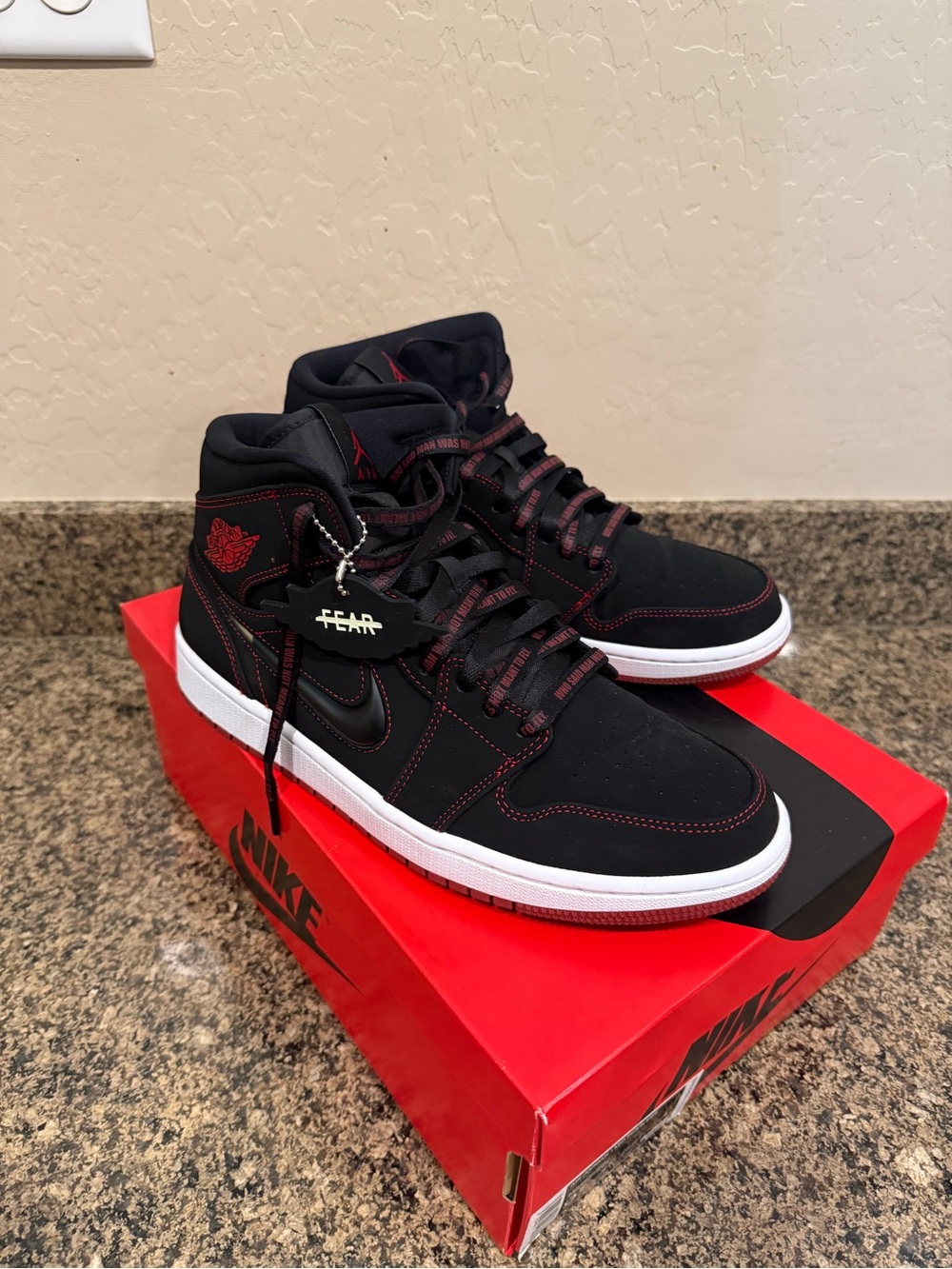 Nike Air Jordan 1 Mid – Black with Red Accents